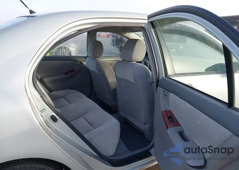 2003 Toyota Corolla Le z USA, uszkodzony, nr VIN 2T1BR38E23C109778